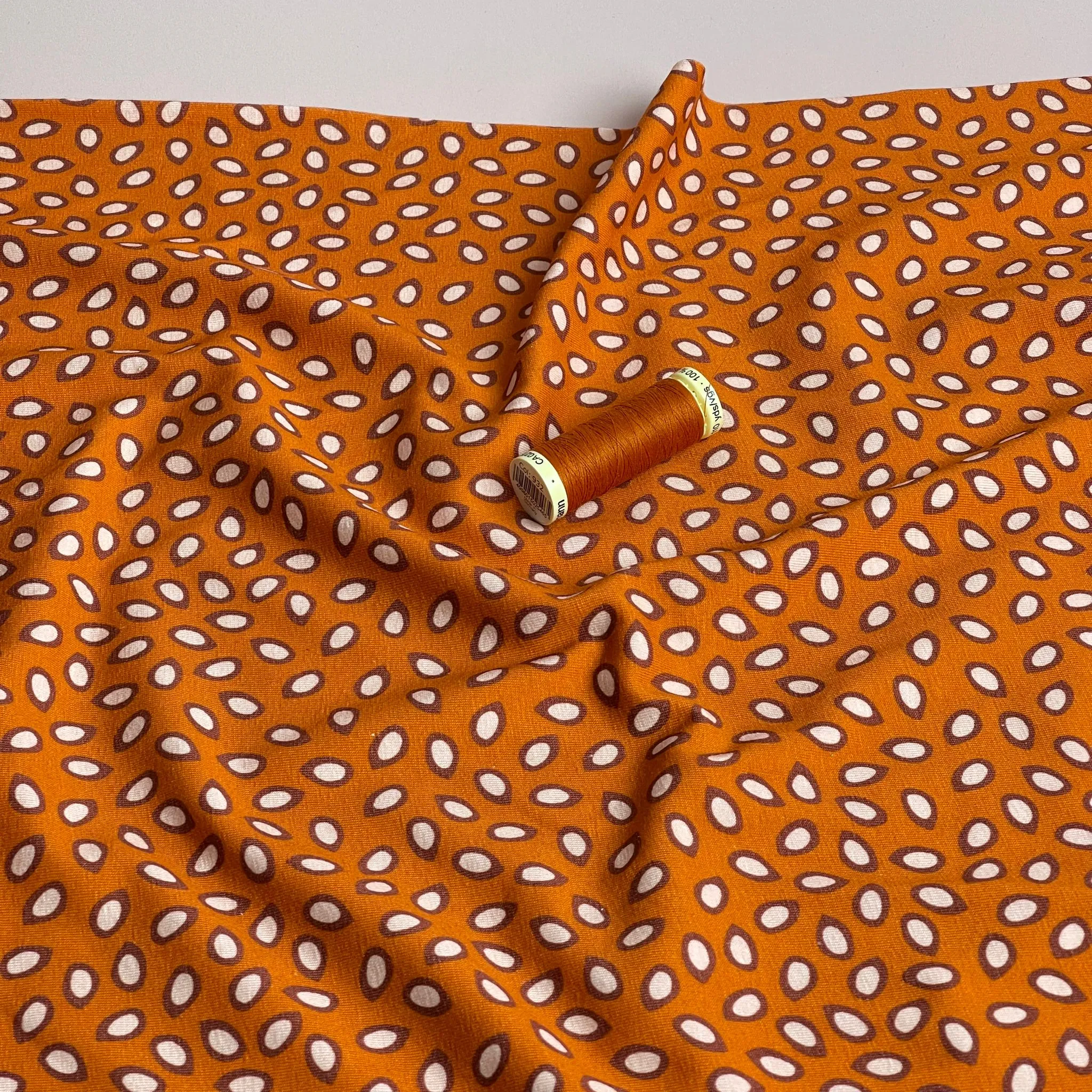 Danish Design - Small Petals on Rust Cotton Jersey Fabric