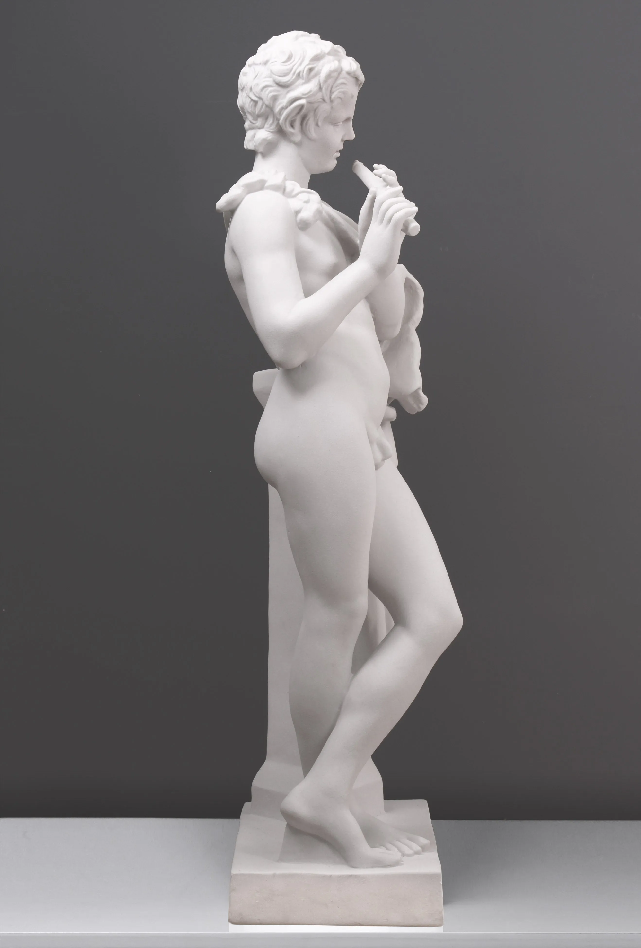 Satyr Playing a Flute Statue