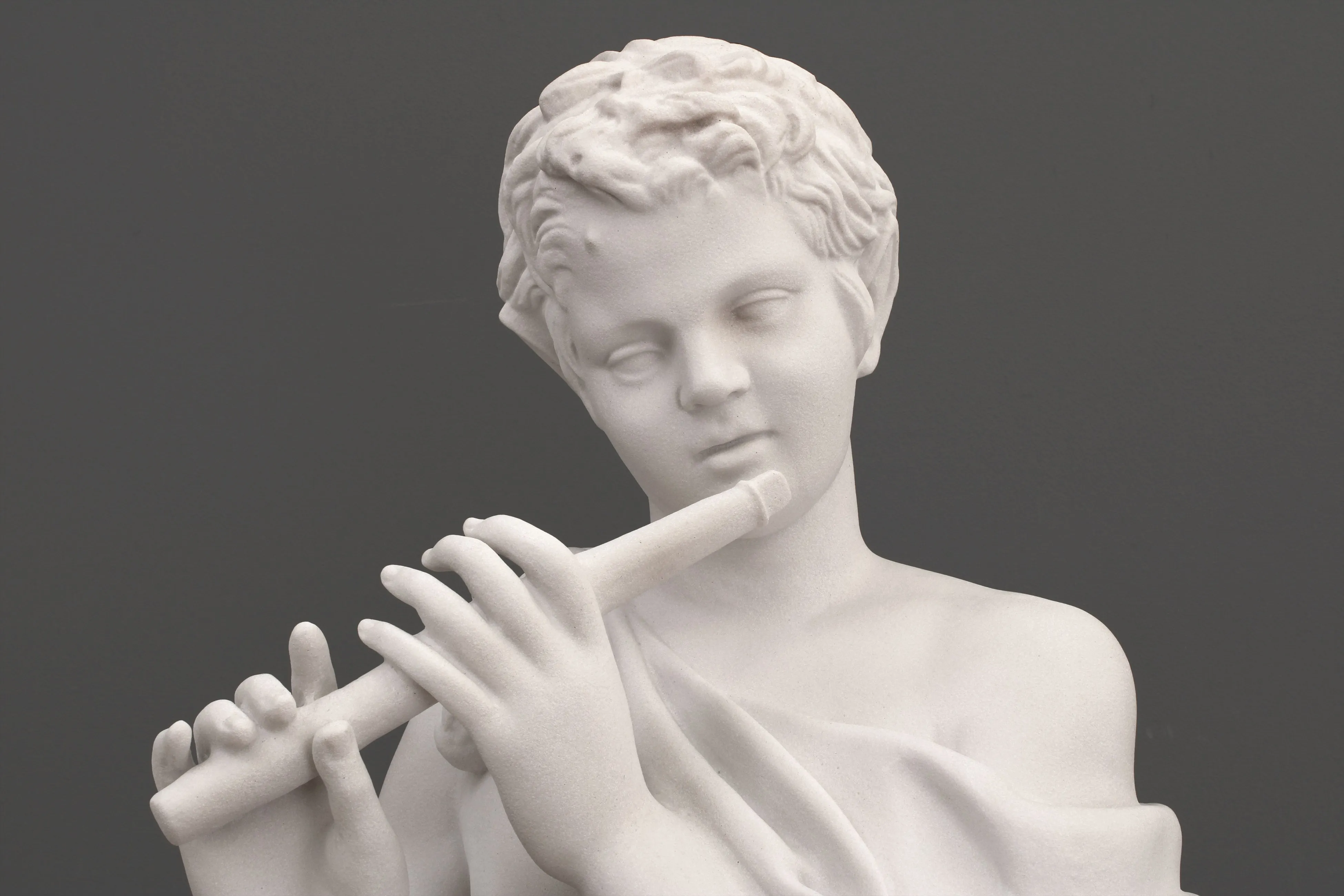 Satyr Playing a Flute Statue